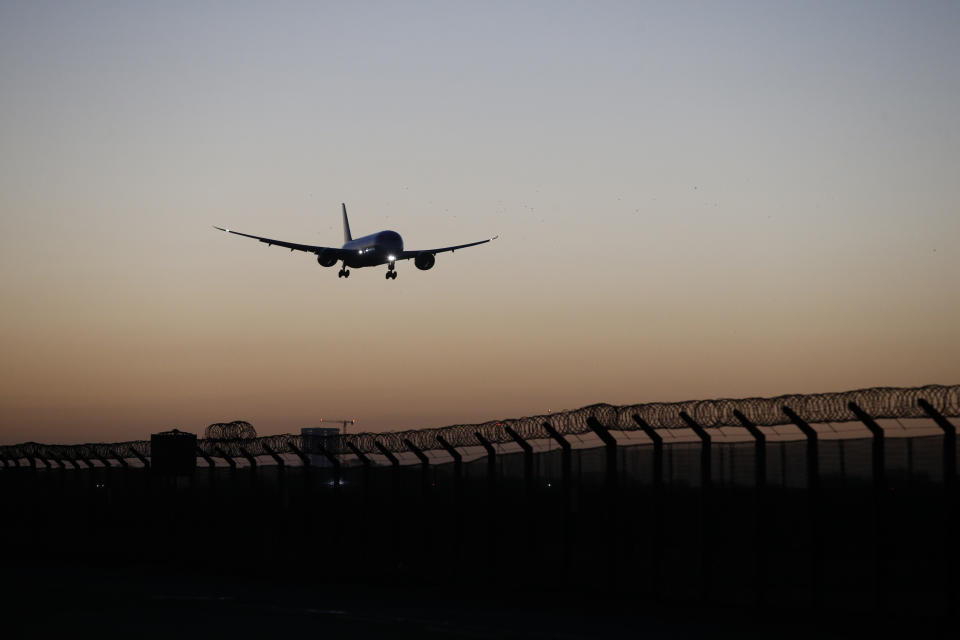 LONDON, ENGLAND - FEBRUARY 26: A plane arrives at Heathrow Airport on February 26, 2021 in London, England. Travellers arriving in the UK from February 15 2021 onwards from countries on the 