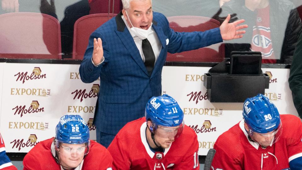 Montreal Canadiens head coach Dominique Ducharme argues a call as Canadiens' Cole Caufield (22), Brendan Gallagher (11) and Chris Wideman (20) look on during third period NHL hockey action Tuesday, October 19, 2021 in Montreal. THE CANADIAN PRESS/Ryan Remiorz
