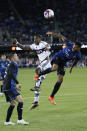 Vancouver Whitecaps forward Sergio Cordova (9) goes up for a header against San Jose Earthquakes defender Rodrigues, right, during the second half of an MLS soccer match in San Jose, Calif., Saturday, March 4, 2023. (AP Photo/Josie Lepe)