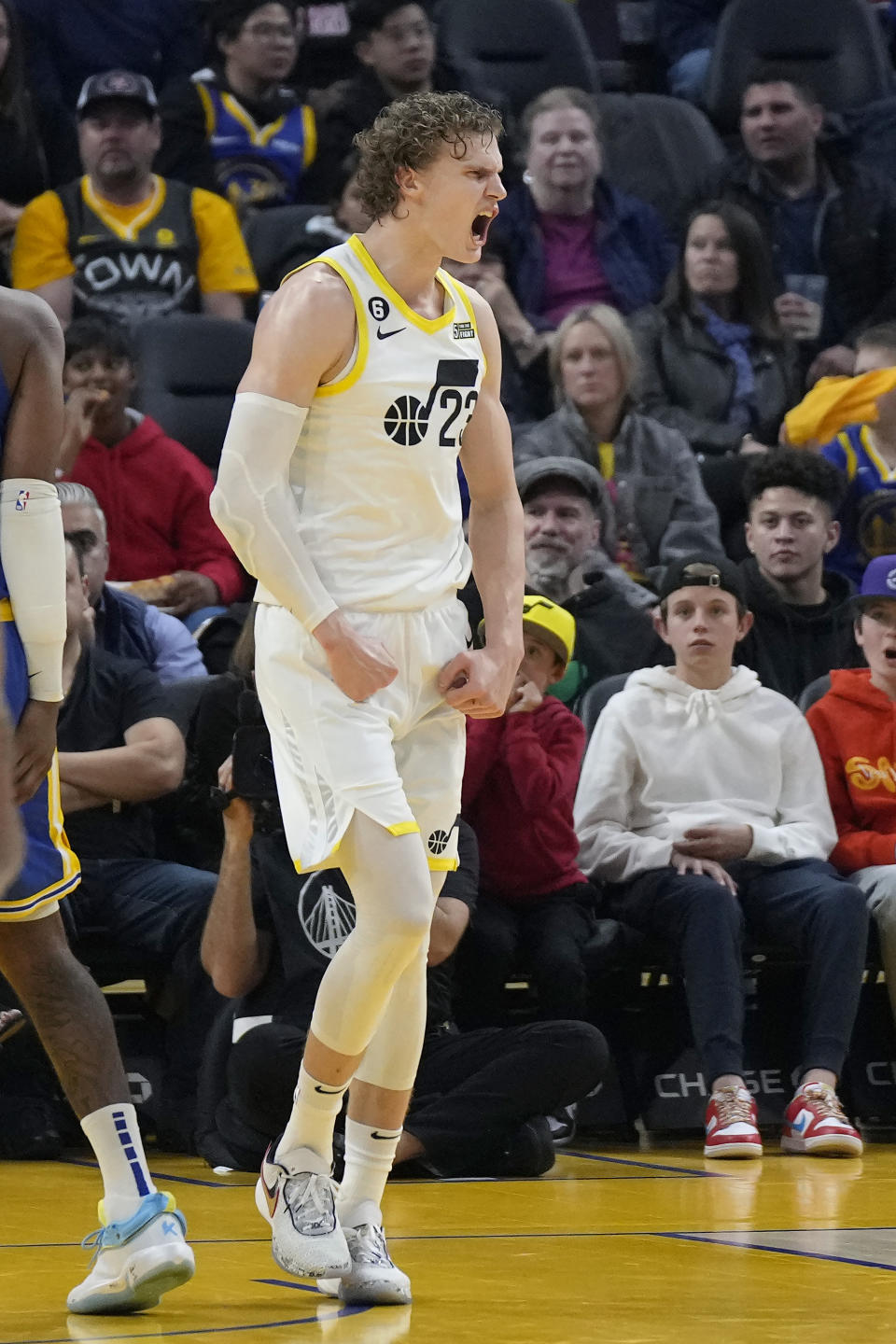 Utah Jazz forward Lauri Markkanen reacts after scoring and being fouled during the first half of the team's NBA basketball game against the Golden State Warriors in San Francisco, Wednesday, Dec. 28, 2022. (AP Photo/Jeff Chiu)