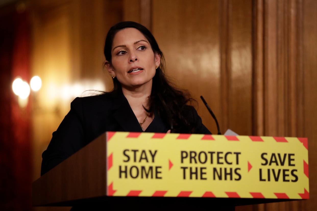 Priti Patel at a media briefing on coronavirus in Downing Street (PA)