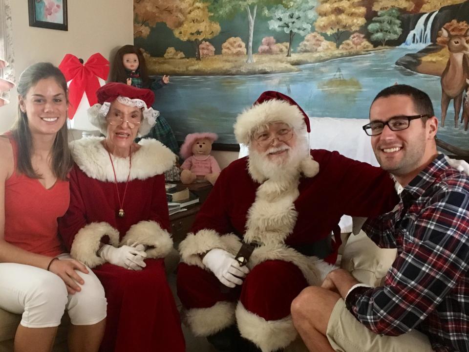 Santa and Mrs. Claus pose with the Meckstroth grandkids during a Christmas gathering.