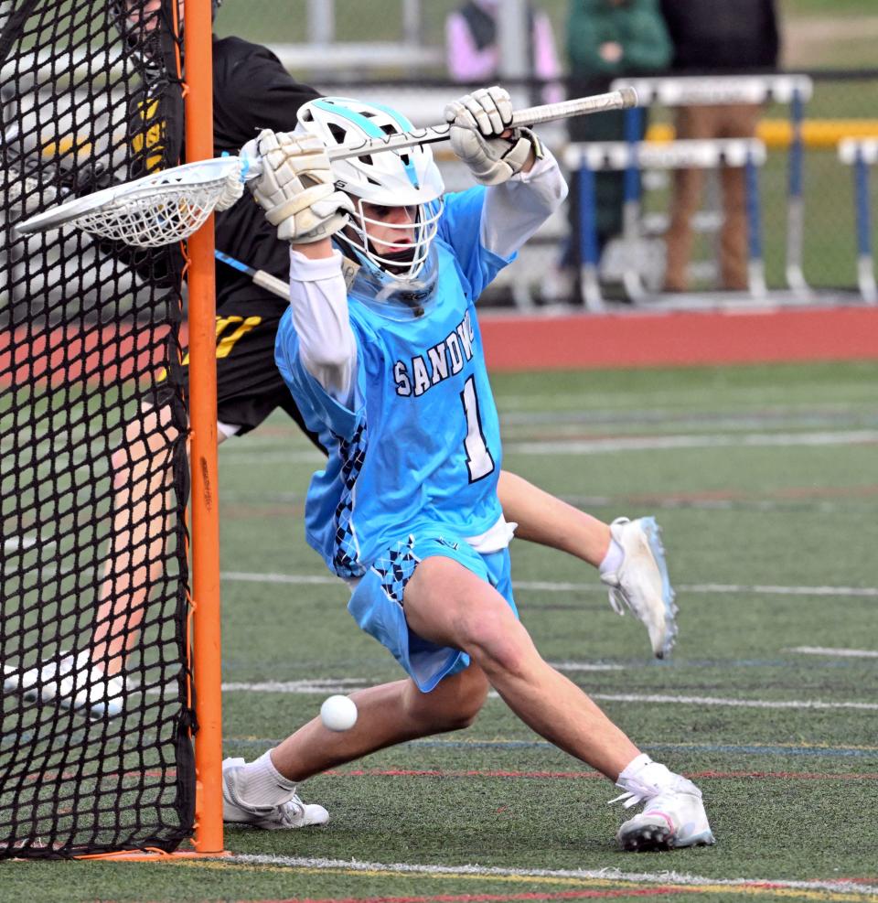 SANDWICH  4/11/23   Sandwich goalie Shane Corcoran stops a Nauset shot.