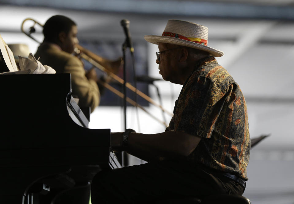 Ellis Marsalis, father and musical teacher of his sons, artists Wynton Marsalis, Branford Marsalis, Jason Marsalis and Delfeayo Marsalis, performs at the New Orleans Jazz and Heritage Festival in New Orleans, Saturday, May 3, 2014. (AP Photo/Gerald Herbert)