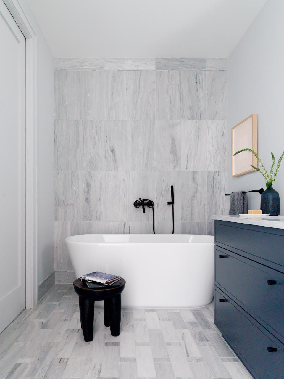 2. Create a focal point with a dark gray bathroom vanity