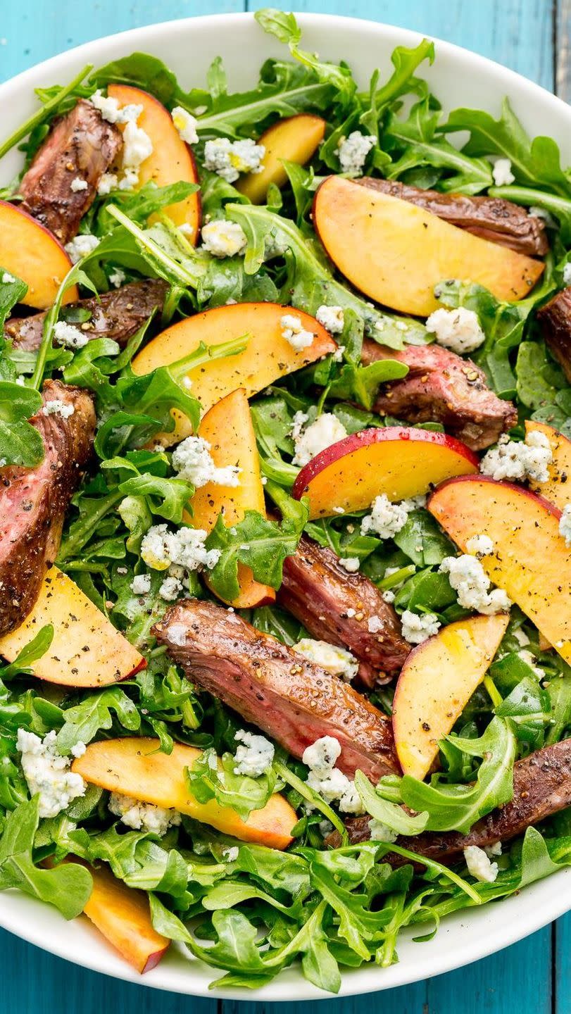 <p>Peppery rocket is the perfect vessel for this savoury-sweet combo.</p><p>Get the <a href="https://www.delish.com/uk/cooking/recipes/a32998377/balsamic-grilled-steak-salad-with-peaches-recipe/" rel="nofollow noopener" target="_blank" data-ylk="slk:Balsamic Grilled Steak Salad with Peaches;elm:context_link;itc:0;sec:content-canvas" class="link ">Balsamic Grilled Steak Salad with Peaches </a>recipe.</p>