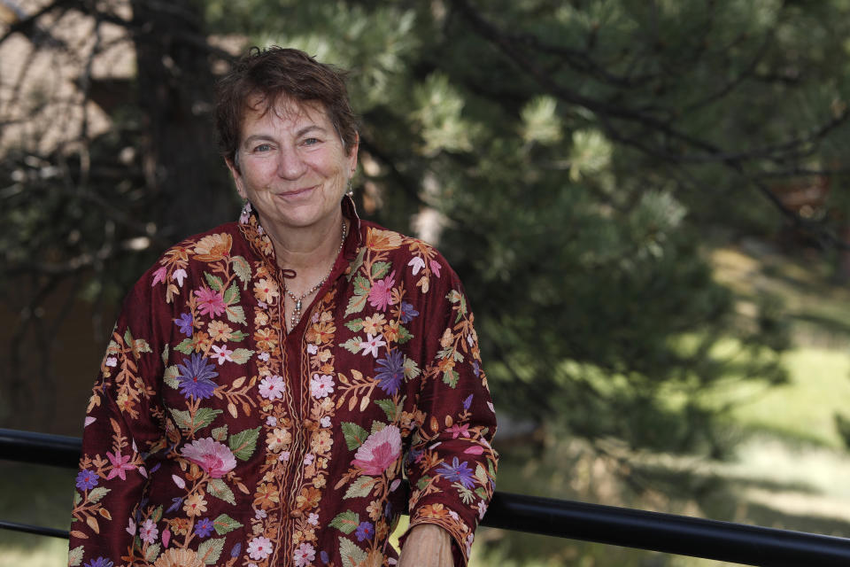 Dr. Barbara Morris is shown outside her home Wednesday, Sept. 4, 2019, in Golden, Colo. Morris has joined forces with her former cancer patient, Neil Mahoney, to say that a Colorado hospital's policy barring the doctor from administering life-ending drugs to Mahoney at his home goes against the state's assisted suicide law. (AP Photo/David Zalubowski)