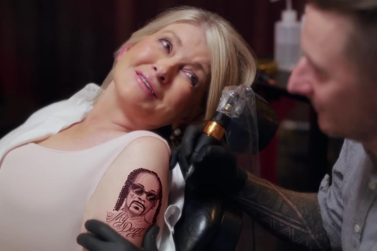 Martha Stewart being tattooed with Snoop Dogg's face for a Superbowl 2023 commercial