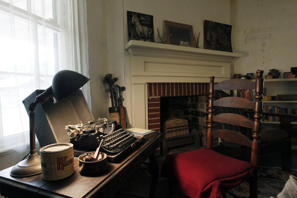 In this June 8, 2012 photograph, the late Nobel Prize laureate William Faulkner's primary writing tool, his portable typewriter, sits on a desk in his office that overlooks the stable at Roan Oak, his home in Oxford, Miss. The home, is now owned and maintained by the University of Mississippi as a museum and is opened to the public, allowing a glimpse into the writer's complex life. (AP Photo/Rogelio V. Solis)