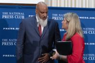 Executive Director of the Major League Baseball Players Association Tony Clark speaks with AFL-CIO President Liz Shuler during a news conference at the Press Club in Washington, Wednesday, Sept. 7, 2022. (AP Photo/Jose Luis Magana)