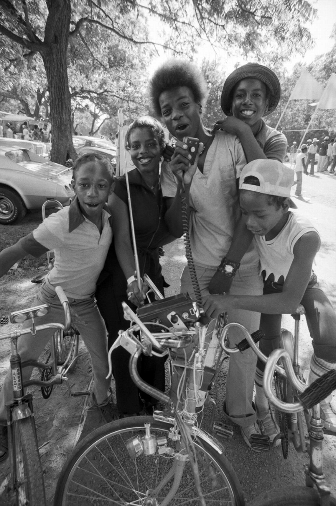 Frank Taylor, 17, attracted attention on the 1977 Juneteenth at Sycamore Park in Fort Worth with his bicycle equipped with a citizens band radio. With him are, from left, Kelly Mitchell, 14; Bobbie Taylor, 16; Fred Taylor, 15; and Willie Nolan, 13.