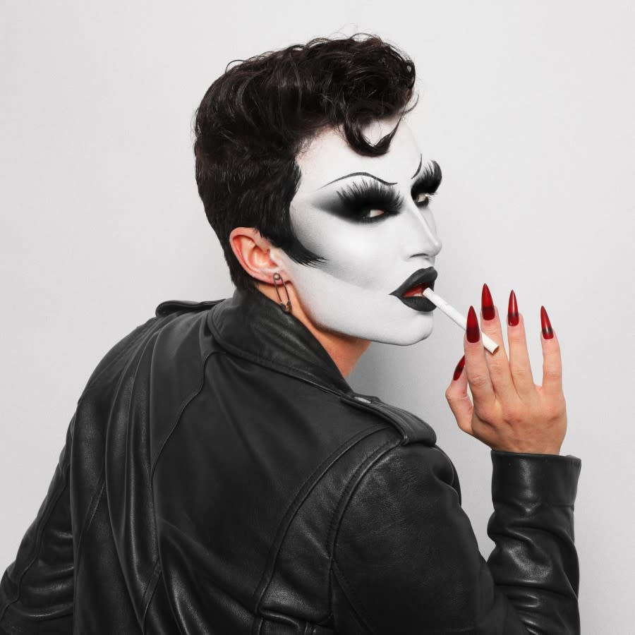 Gottmilk from Drag Race is dressed up as Danny Zucko from Grease.