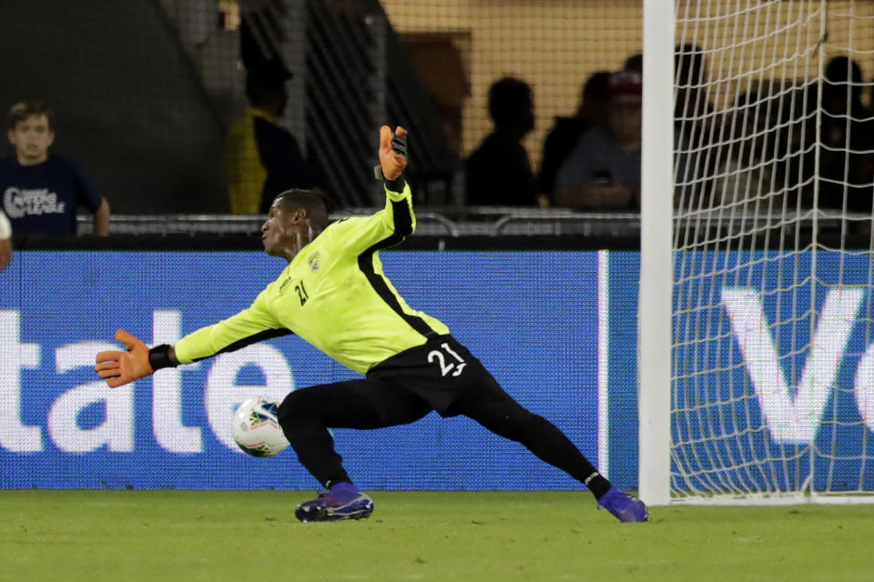 A shot by United States' Josh Sargent, not visible, gets by Cuba goalkeeper Nelson Johnston for a goal during the first half of a CONCACAF Nations League soccer match Friday, Oct. 11, 2019, in Washington. (AP Photo/Julio Cortez)