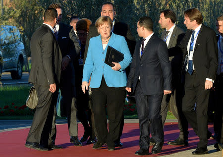 German Chancellor Angela Merkel arrives to the Intergovernmental Conference to Adopt the Global Compact for Safe, Orderly and Regular Migration, in Marrakesh, Morocco December 10, 2018. REUTERS/Abderrahmane Mokhtari