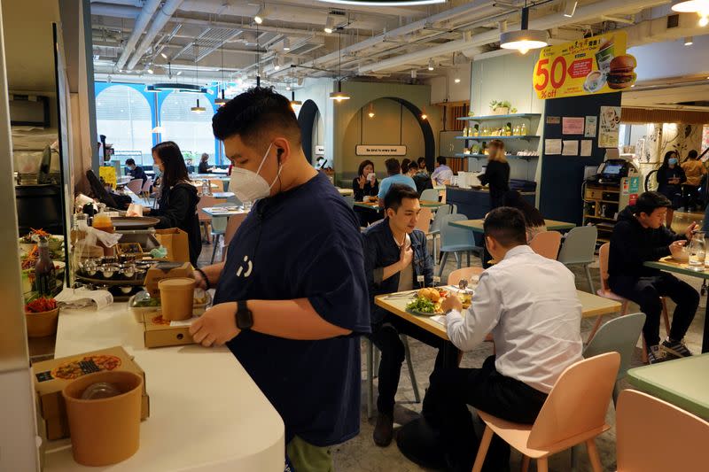 Customers dine at a vegan restaurant Kind Kitchen that serves plant-based meat in Hong Kong