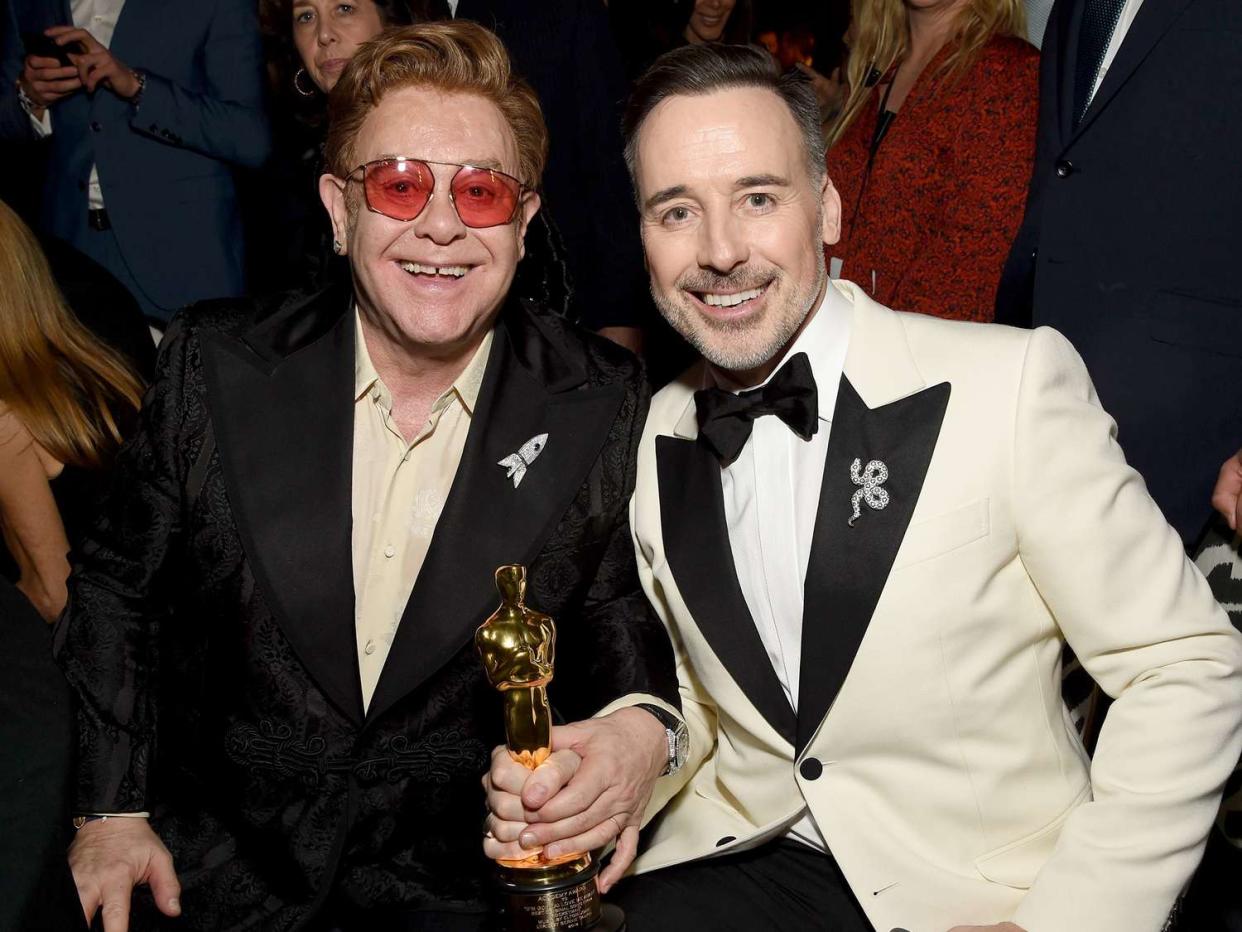 Elton John and David Furnish attend the 28th Annual Elton John AIDS Foundation Academy Awards Viewing Party on February 09, 2020 in West Hollywood, California