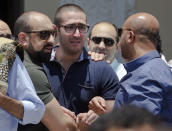 Relatives and friends of Salah Abu Laban, Sahar Qouidar, Ghassan Abu Laban and Reem al-Sebaei, all victims of EgyptAir flight 804, grieve following prayers for the dead at al Thawrah Mosque in Cairo, May 20, 2016. (AP/Amr Nabil)