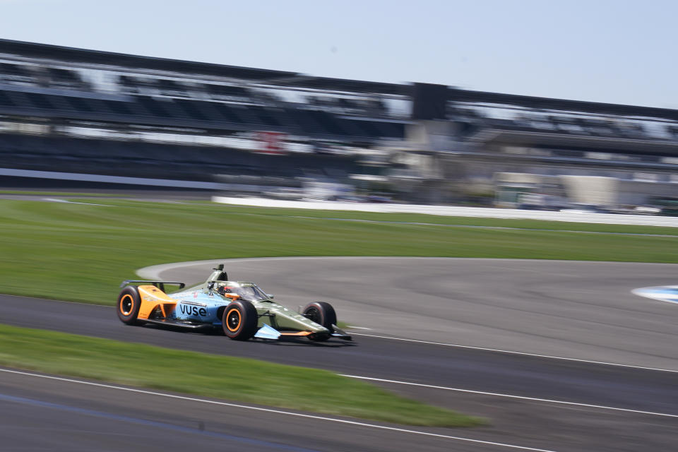 Felix Rosenqvist, of Sweden, drives off the apron during testing at Indianapolis Motor Speedway, Thursday, April 21, 2022, in Indianapolis. (AP Photo/Darron Cummings)