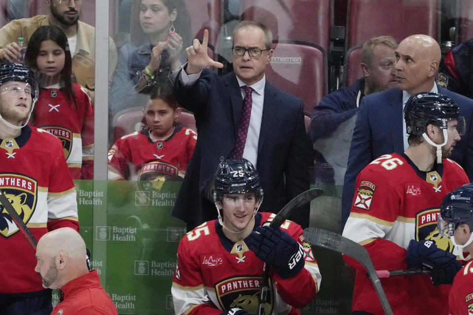 Florida Panthers head coach Paul Maurice gestures during the third period of an NHL hockey game, Tuesday, Oct. 24, 2023, in Sunrise, Fla. The Panthers defeated the Sharks 3-1. (AP Photo/Marta Lavandier)