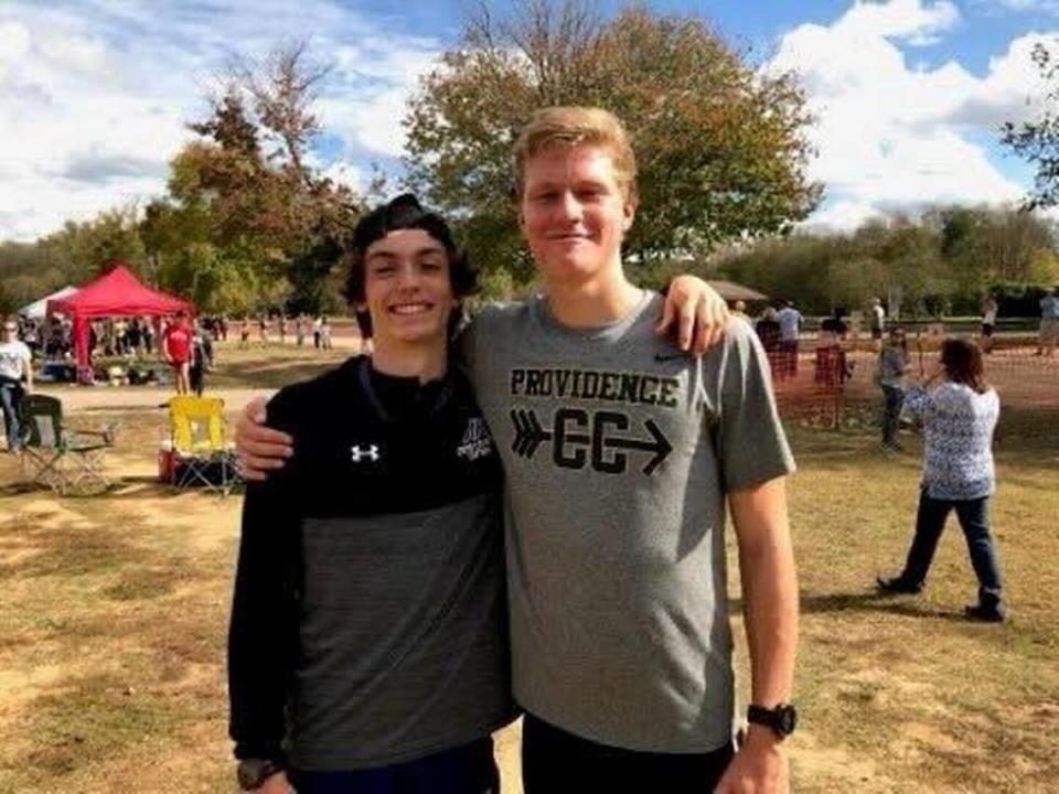 Carson Philbin and Elliott Schultz at a cross country meet as Charlotte highschoolers. Philbin died cliffdiving in Ka’u, Hawaii, on Saturday, Jan. 13, 2024.