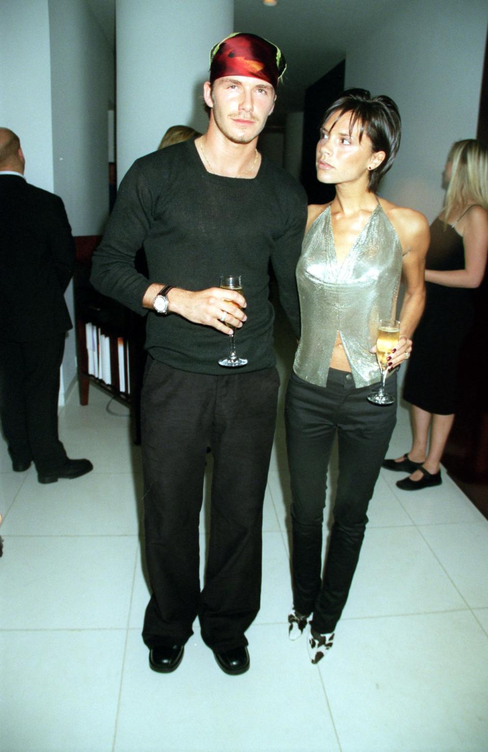 Posh and Becks loved to add flair to their looks with standout accessories (DAVE BENETT)