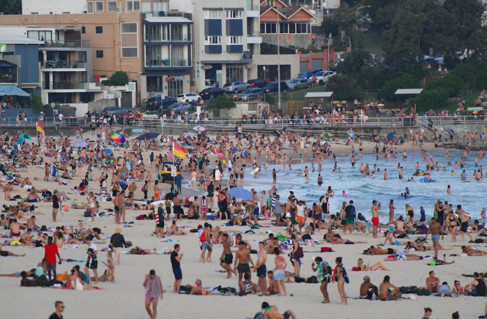 The crowd at Sydney's Bondi Beach on Saturday night as temperatures remained in the high 30s at 7pm. Photo: AAP