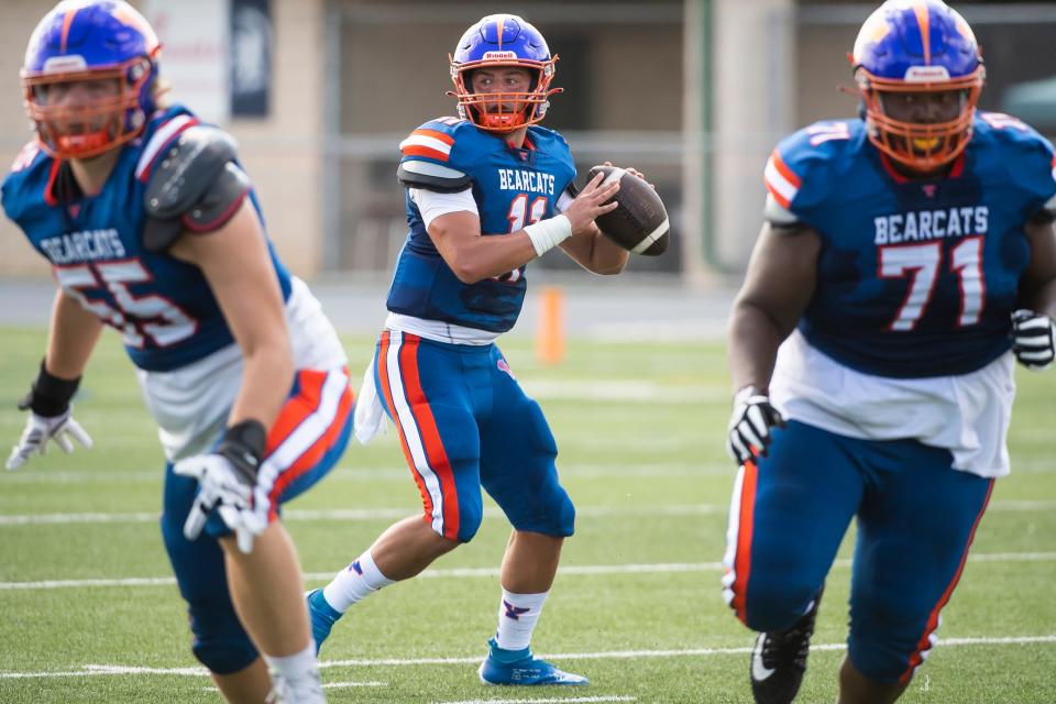 York High senior quarterback Sam Stoner looks to throw in the second quarter against Woodland Hills during the Chambersburg Peach Bowl football showcase on Saturday, August 27, 2022.