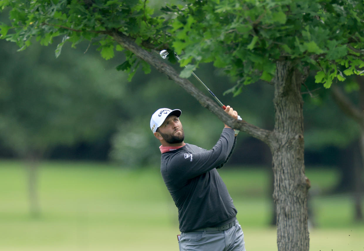 TULSA, OKLAHOMA - MAY 22: Jon Rahm of Spain plays his second shot on the 12th hole during the final round of the 2022 PGA Championship at Southern Hills Country Club on May 22, 2022 in Tulsa, Oklahoma. (Photo by David Cannon/Getty Images)