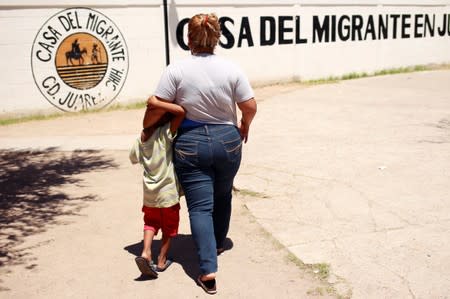 Honduran migrant Denia Carranza, 24, and her son Robert, 7, who have given up their U.S. asylum claim under the Migrant Protection Protocol (MPP), are seen at Casa del Migrante migrant shelter, in Ciudad Juarez