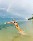 <p>It was just another day in paradise for the model, who frolicked in the ocean in a teeny bikini while in the Dominican Republic. The <em>America’s Got Talent</em> judge took a break from filiming the new season of <em>Germany’s Next Top Model </em>to get some swim time under a rainbow. (Photo: <a rel="nofollow noopener" href="https://www.instagram.com/p/BbLCi6pgn8U/?taken-by=heidiklum" target="_blank" data-ylk="slk:Heidi Klum via Instagram;elm:context_link;itc:0;sec:content-canvas" class="link ">Heidi Klum via Instagram</a>) </p>