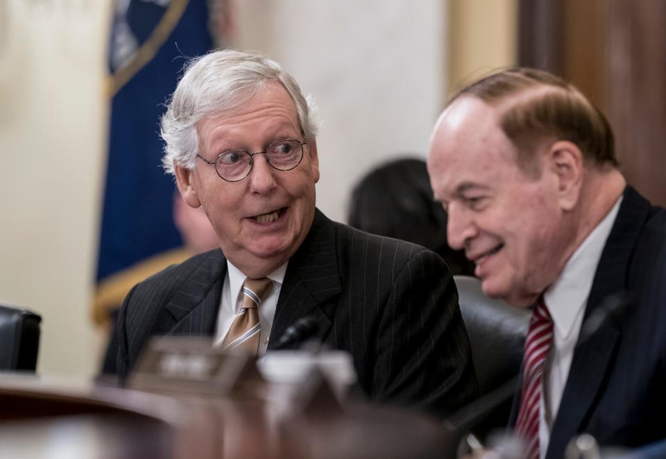 Senate Minority Leader Mitch McConnell, R-Ky., left, speaks to Sen. Richard Shelby, R-Ala., as they attend a Senate Rules and Administration Committee meeting on the Electoral Count Reform and Presidential Transition Improvement Act, at the Capitol in Washington, Tuesday, Sept. 27, 2022. The bill is a response to the Jan. 6 insurrection and former President Donald Trump's efforts to find a way around the 19th-century law that, along with the Constitution, governs how states and Congress certify electors and declare presidential election winners. (AP Photo/J. Scott Applewhite) ORG XMIT: DCSA101