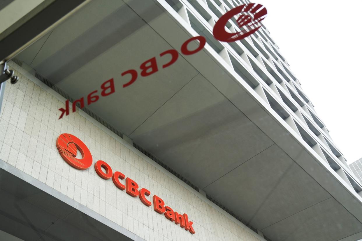 Signage of Oversea-Chinese Banking Corp. (OCBC) at its headquarters in Singapore, on Friday, Feb. 24, 2023. Oversea-Chinese Banking Corp. reported a rise in fourth-quarter profit that missed estimates, as a surge in lending income was eclipsed by a drop in fee income.