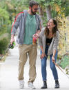 <p>Ben Affleck and Ana de Armas share a laugh on Wednesday during a walk with their dogs in L.A. </p>