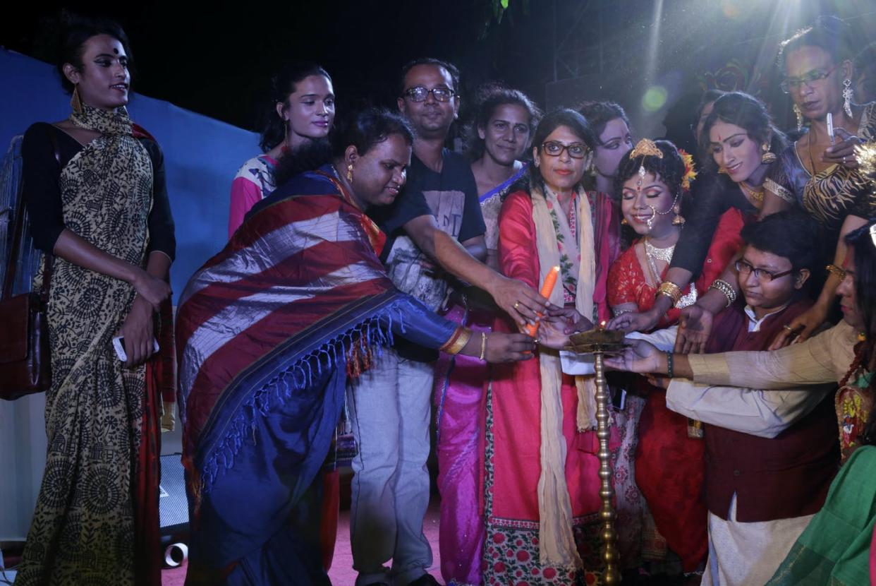 <span class="caption">Members of the Association of Transgender and Hijra at Bengal light a lamp to mark Transgender Day of Bengal in Kolkata, India, in 2017.</span> <span class="attribution"><a class="link " href="https://newsroom.ap.org/detail/IndiaTrangenders/150991d3665046a694f2f9d7c125ce8e/photo?Query=hijra%20india&mediaType=photo&sortBy=&dateRange=Anytime&totalCount=15&currentItemNo=13" rel="nofollow noopener" target="_blank" data-ylk="slk:AP Photo/Bikas Das;elm:context_link;itc:0;sec:content-canvas">AP Photo/Bikas Das</a></span>