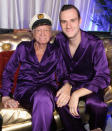 <p>Hefner is pictured with his son Cooper at the annual Midsummer Night’s Dream Party at the Playboy Mansion in August, 2014. The duo opted to don co-ordinating silk pyjamas. <em>[Photo: Getty]</em> </p>