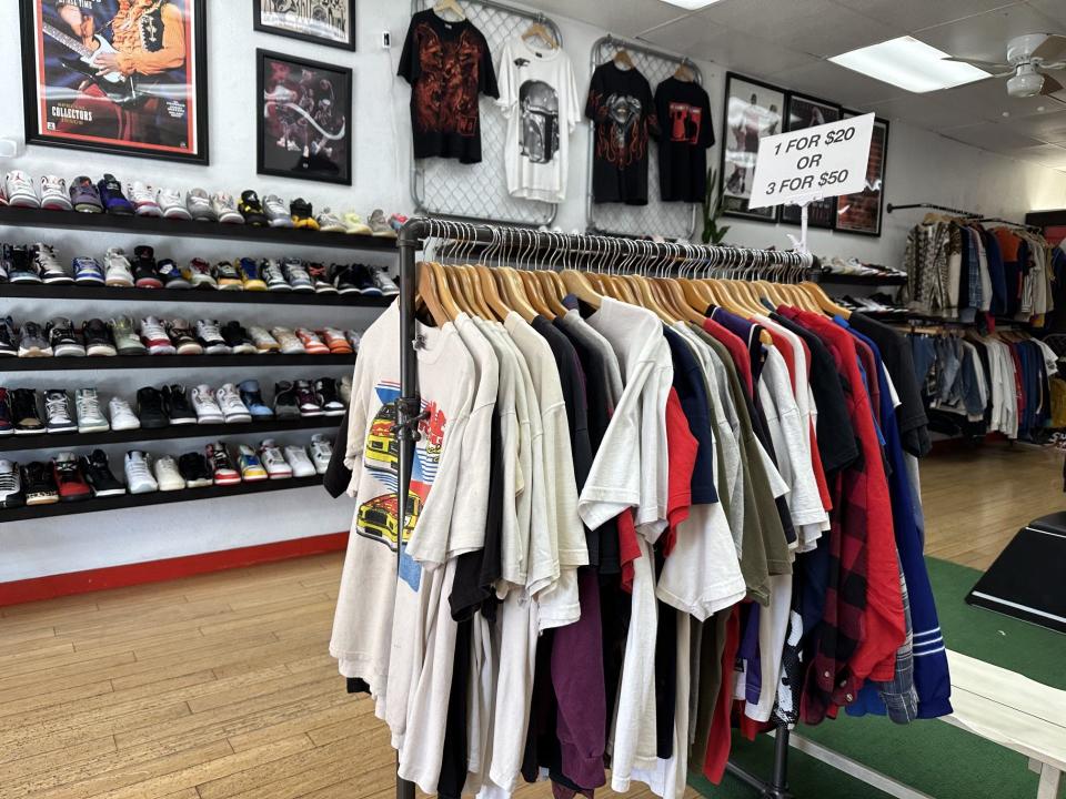 Vintage sports jackets, tees and sneakers can be found at N9NE at the Miracle Mile. (Photo taken Friday, Dec. 1, 2023.)