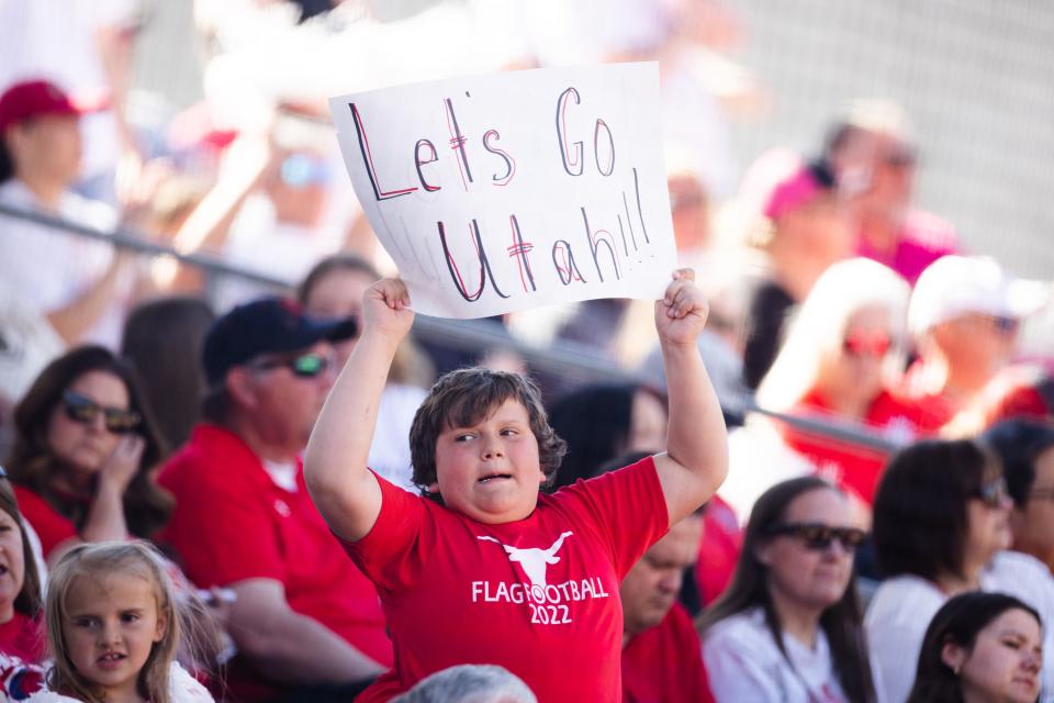 A fan holds up a sign during an NCAA softball game between Utah and UCLA at Dumke Family Softball Stadium in Salt Lake City on April 29, 2023. | Ryan Sun, Deseret News