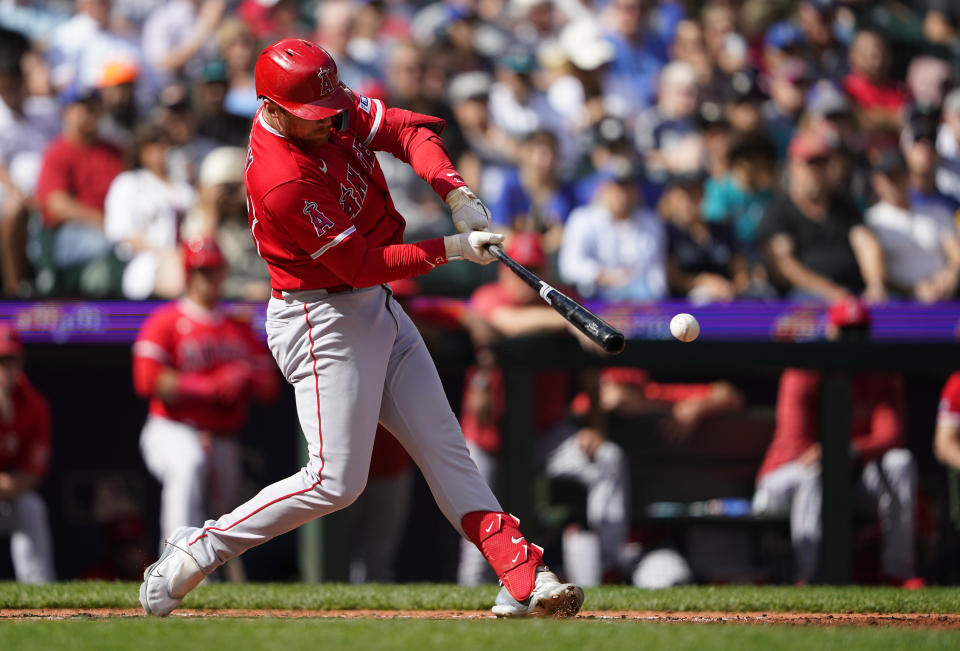 Los Angeles Angels' Brandon Drury hits an RBI double to score Zach Neto against the Los Angeles Angels during the fourth inning of a baseball game Wednesday, Sept. 13, 2023, in Seattle. (AP Photo/Lindsey Wasson)