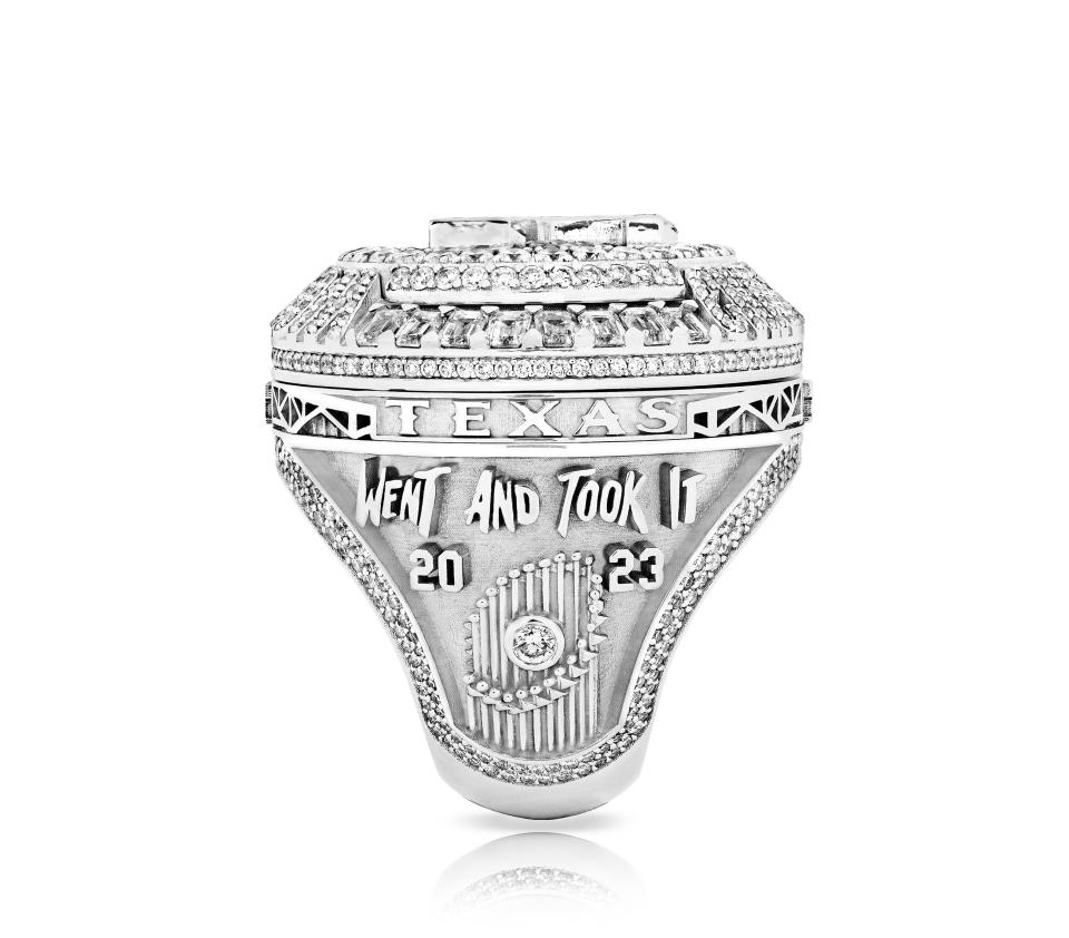 The Texas Rangers championship ring features an image of the World Series trophy with a single diamond to represent the franchise's first title.