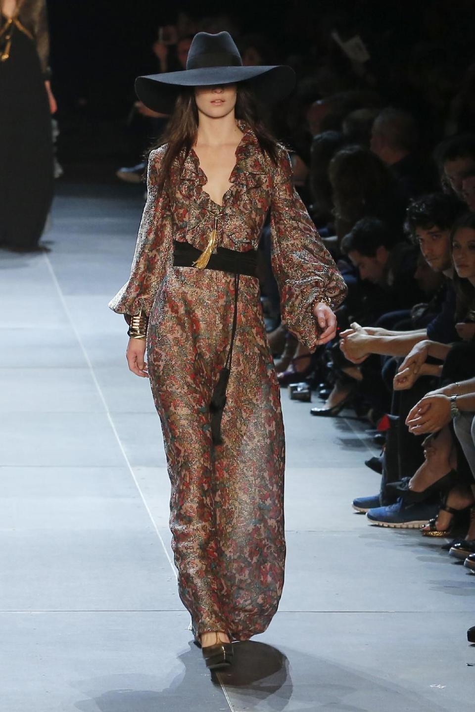 A model wears a creation by French born fashion designer Hedi Slimane for Saint Laurent ready to wear Spring-Summer 2013 collection, presented in Paris, Monday, Oct. 1, 2012. (AP Photo/Jacques Brinon)