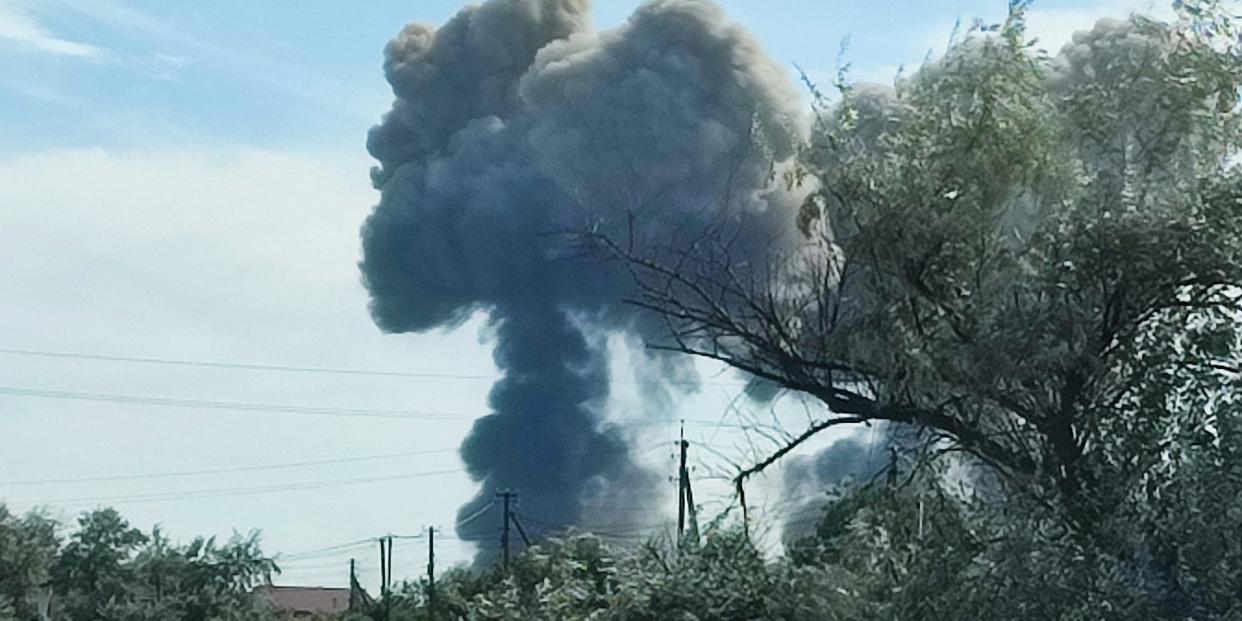 Smoke rises after explosions were heard from the direction of a Russian military airbase near Novofedorivka, Crimea August 9, 2022