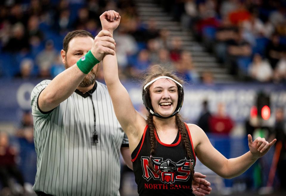 North Salem’s Mariko Sonis celebrates a win against Redmond’s Mia Pedersen in the OSAA 6A/5A state championship on Saturday, Feb. 24, 2024 at Veterans Memorial Coliseum in Portland, Ore.