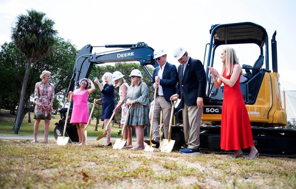 Preservation Foundation board chair Betsy Shiverick, from left; Town Council Members Bridget Moran, Julie Araskog, Bobbie Lindsay, Danielle Moore, Ted Cooney and Lew Crampton; and Preservation Foundation CEO Amanda Skier take part in groundbreaking ceremony at Phipps Ocean Park on Friday.