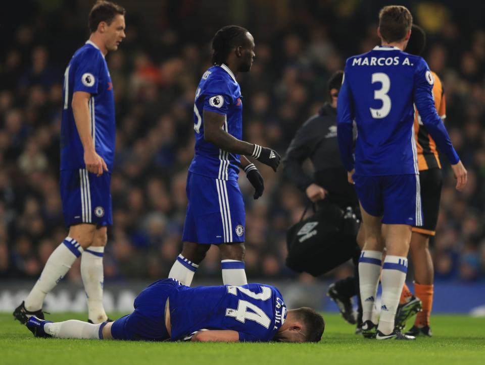 <p>Cahill is hurt as part of the collision </p>