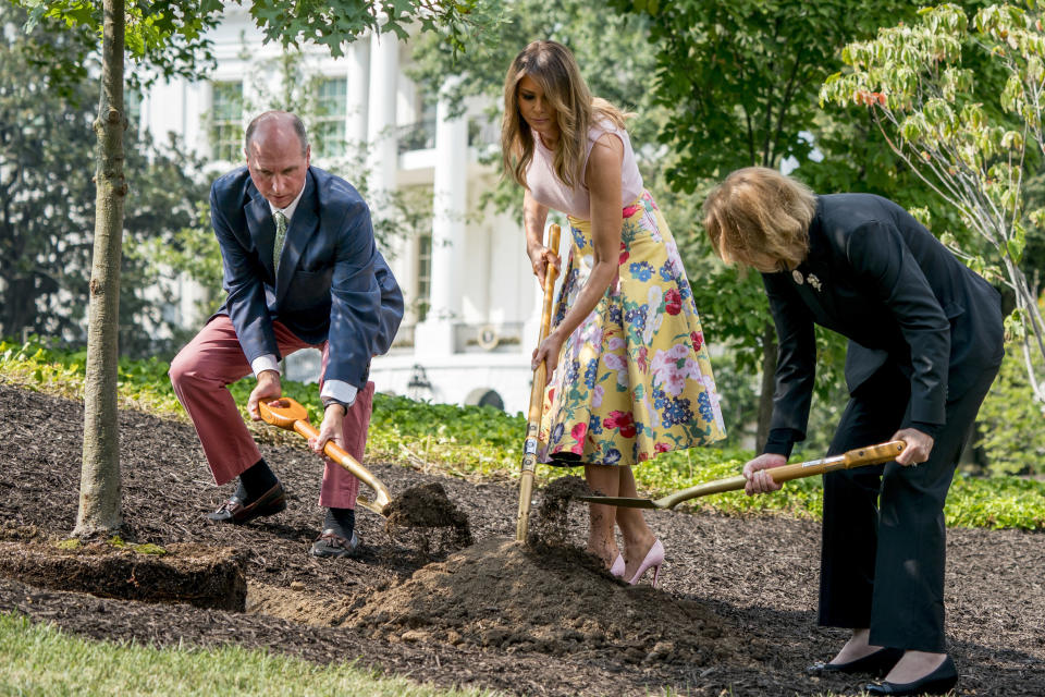 Melania Trump, center