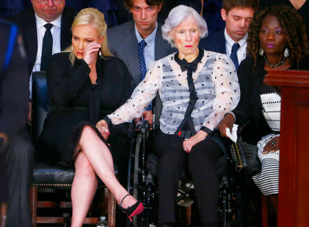 Roberta McCain (R), mother of late U.S. Senator John McCain and his daughter Meghan McCain look on as his body lies in state inside the U.S. Capitol Rotunda in Washington, U.S., August 31, 2018. REUTERS/Eric Thayer