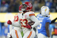 Kansas City Chiefs middle linebacker Anthony Hitchens reacts after grabbing an interception during the first half of an NFL football game against the Los Angeles Chargers, Thursday, Dec. 16, 2021, in Inglewood, Calif. (AP Photo/Marcio Jose Sanchez)