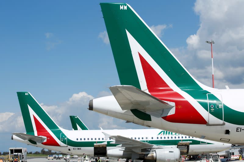 FILE PHOTO: Alitalia planes are seen on the tarmac at Fiumicino International Airport in Rome