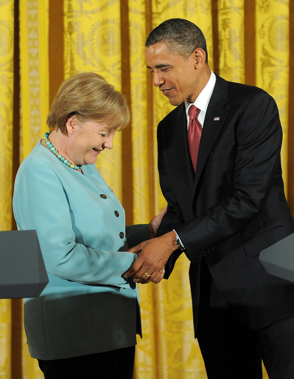 U.S. President Barack Obama shakes hands with German Chancellor Angela Merkel after a joint press conference following their meeting in the East Room of the White House in Washington, D.C., on June 7, 2011.