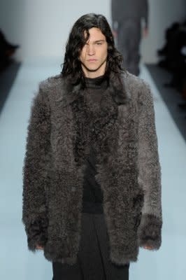 At Duckie Brown, a male runway model in fur. (Photo by Jemal Countess/Getty Images for IMG)